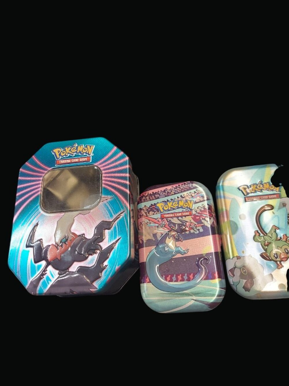Pokemon Trading Card Game Collectible Tin Set Featuring Various Designs